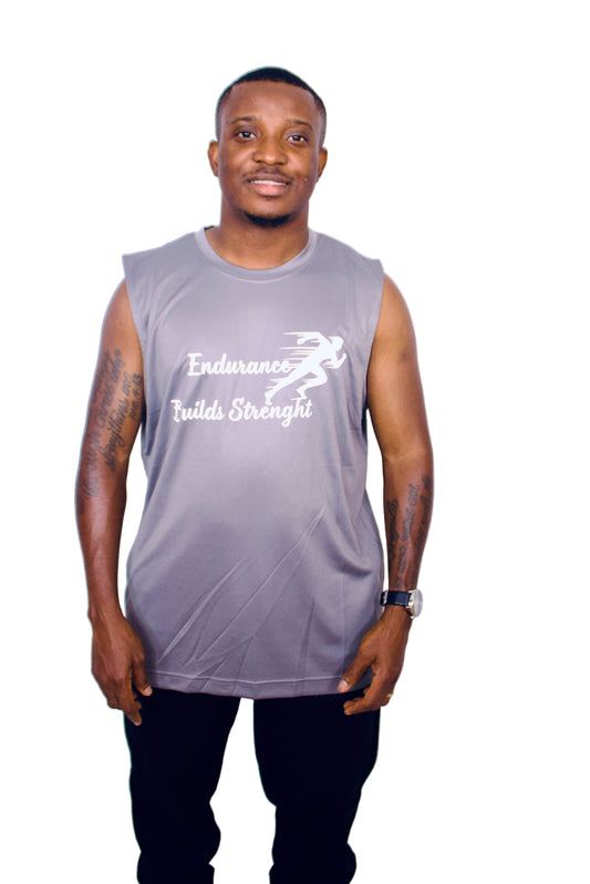 Man wearing a gray sleeveless shirt with text on a white background
