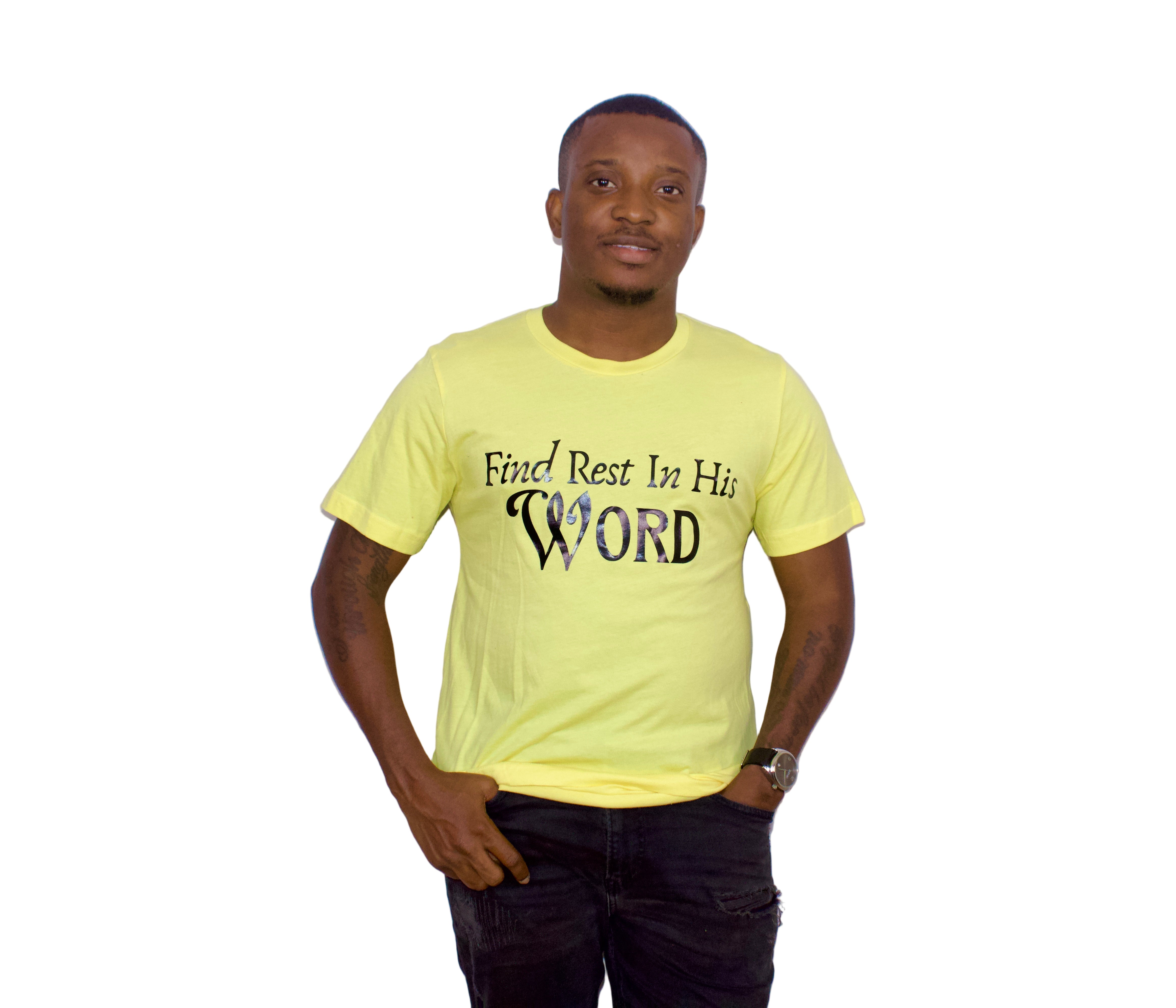 Person wearing a yellow t-shirt with text on a plain background
