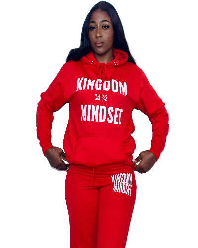 Person wearing a red 'Kingdom Mindset' hoodie and pants on a white background
