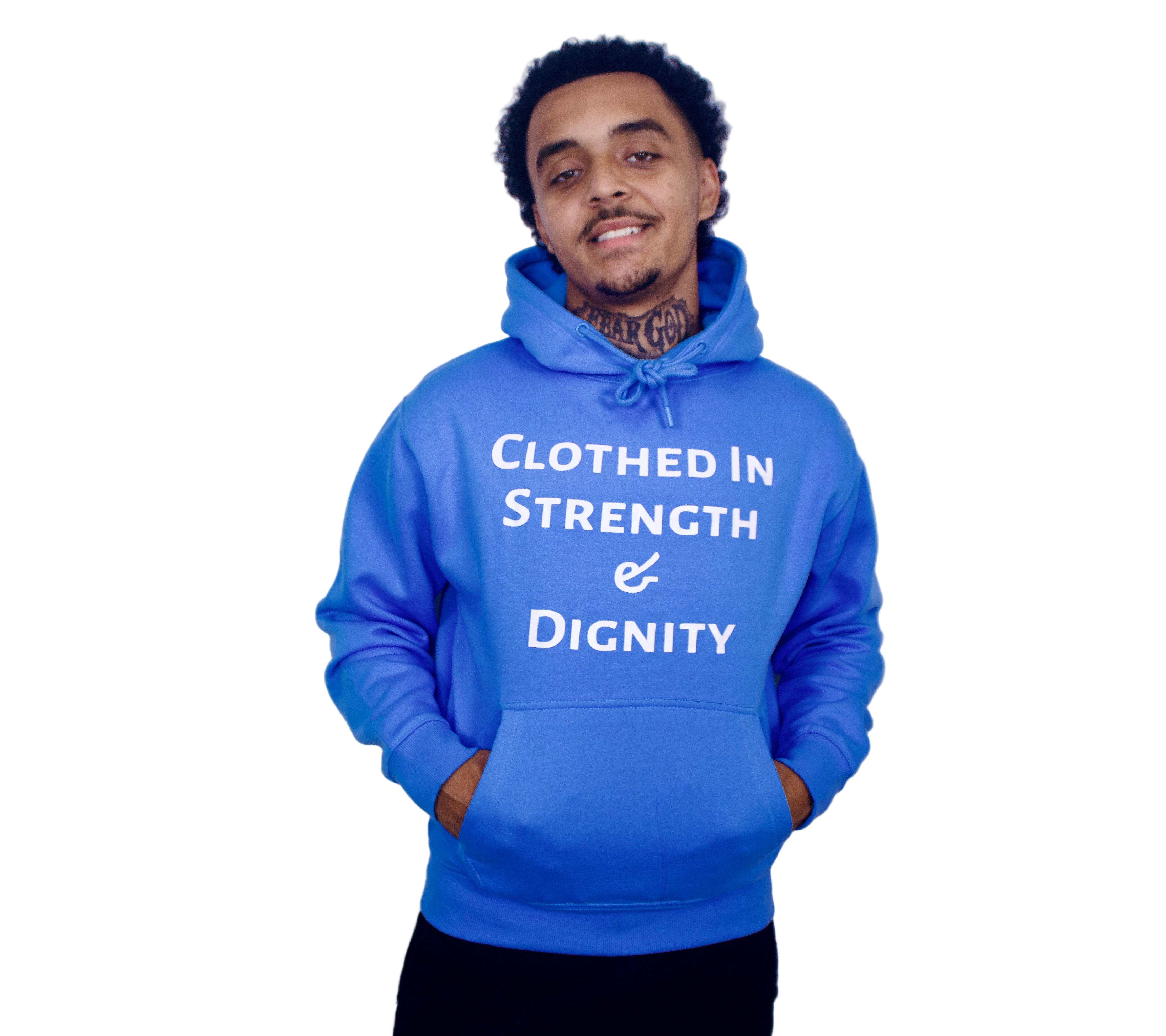 Person wearing a blue hoodie with 'Clothed in Strength & Dignity' text on a plain background