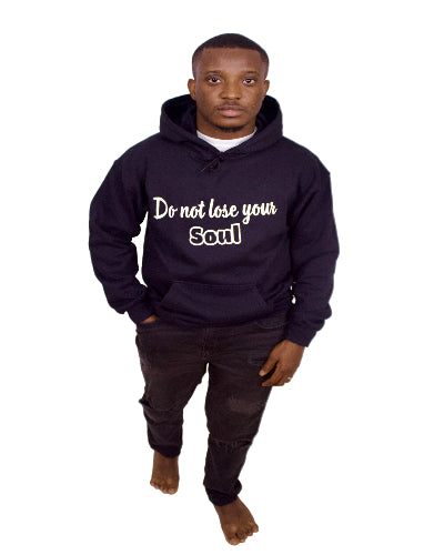 Person wearing a black hoodie with text on a plain background